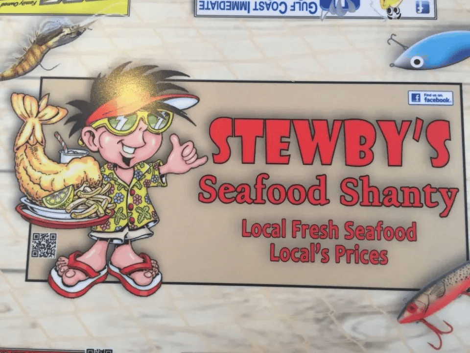 Cartoon character holding a plate of fried seafood, wearing sunglasses, a hat, and a Hawaiian shirt, next to the text